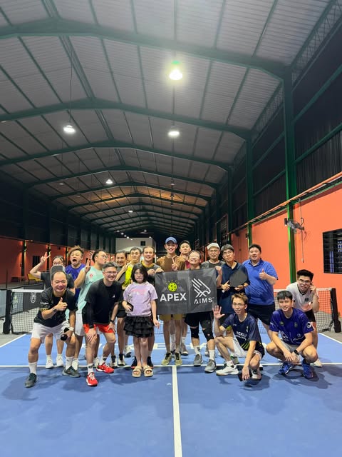 AIMS and APEX pickleball players together after a game